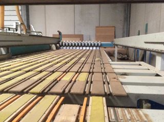 Macchina per la lavorazione del legno Sigmatic Legnomac vende macchine per la lavorazione del legno. Macchina Impianto angolare di Sezionatura Giben mod Sigmatic anno 2001