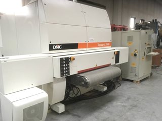 Macchina per la lavorazione del legno Topsand 2000 Legnomac vende macchine per la lavorazione del legno. Macchina Calibratrice Levigatrice marca DMC modello Topsand 2000 a 5 nastri